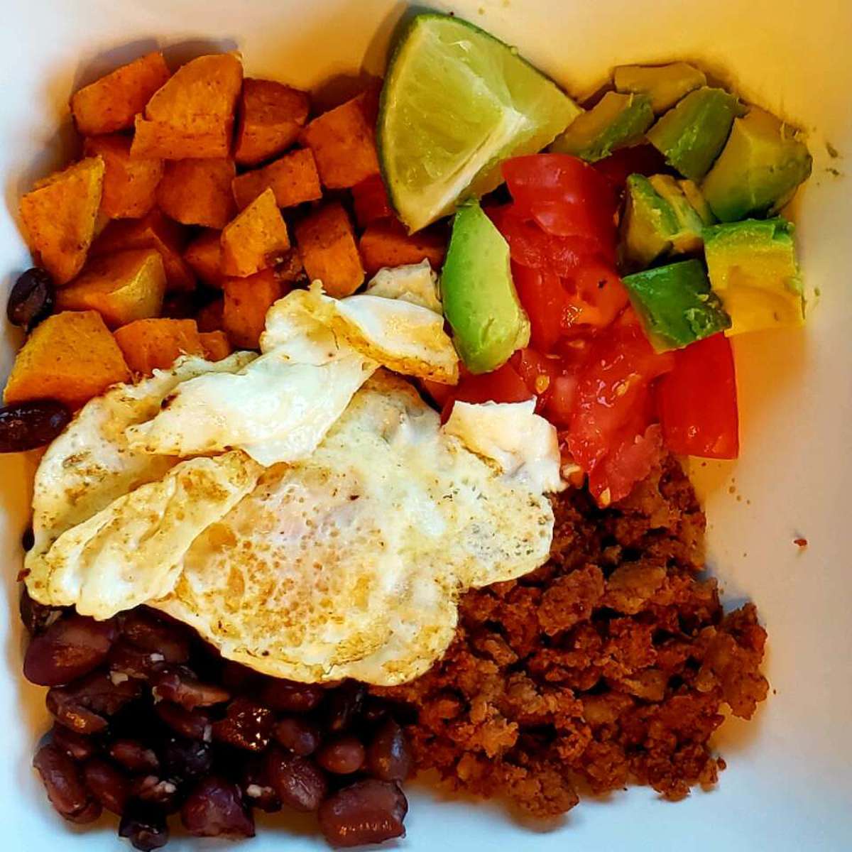Delicious Roasted Sweet Potato, Black Bean, and Chorizo Breakfast Bowls Recipe