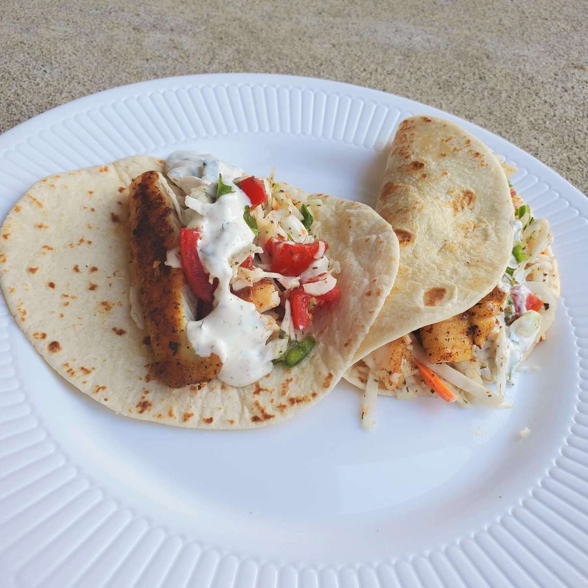Delicious Fish Tacos Recipe with Cabbage Salsa and Yogurt Sauce