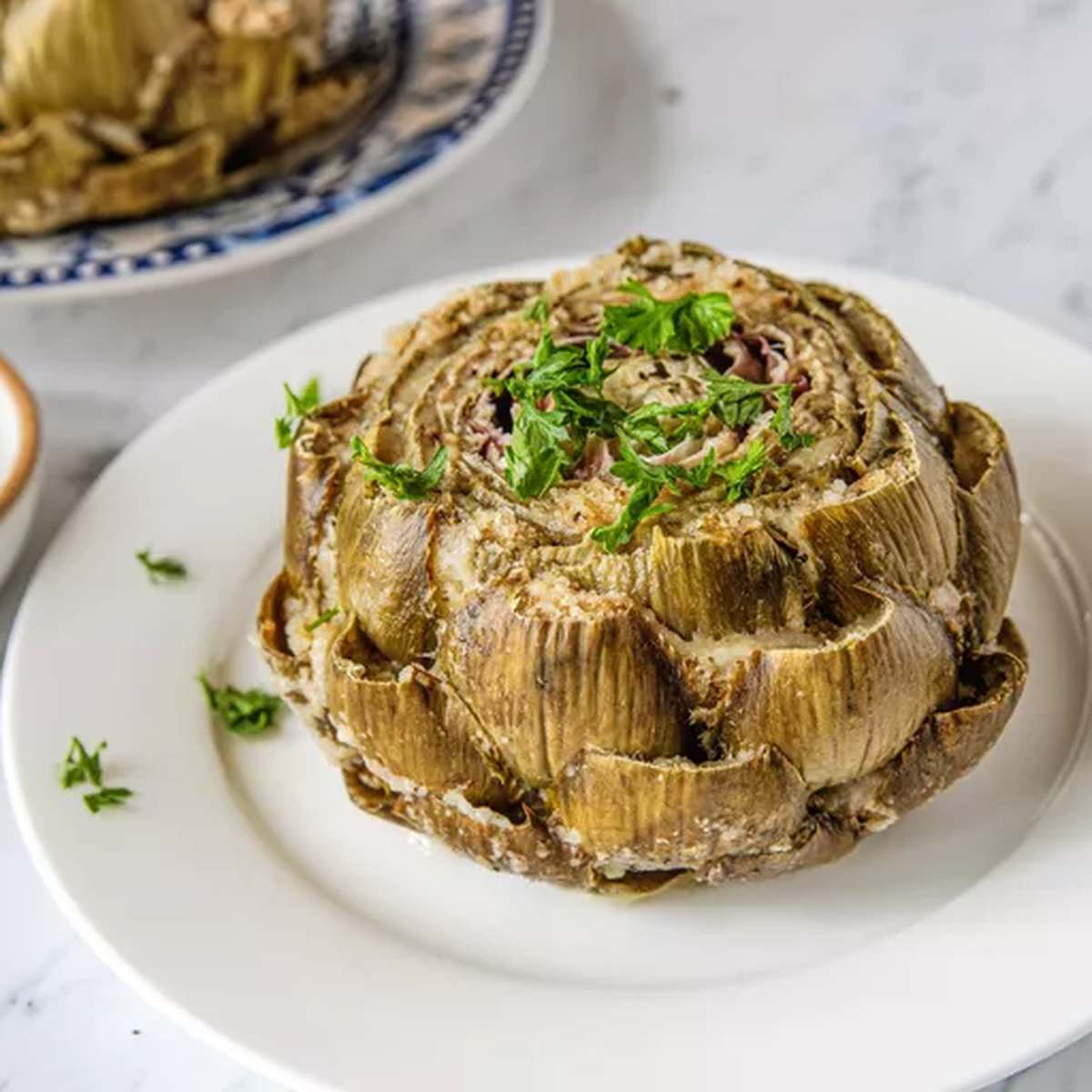 Cheesy Stuffed Artichokes Recipe